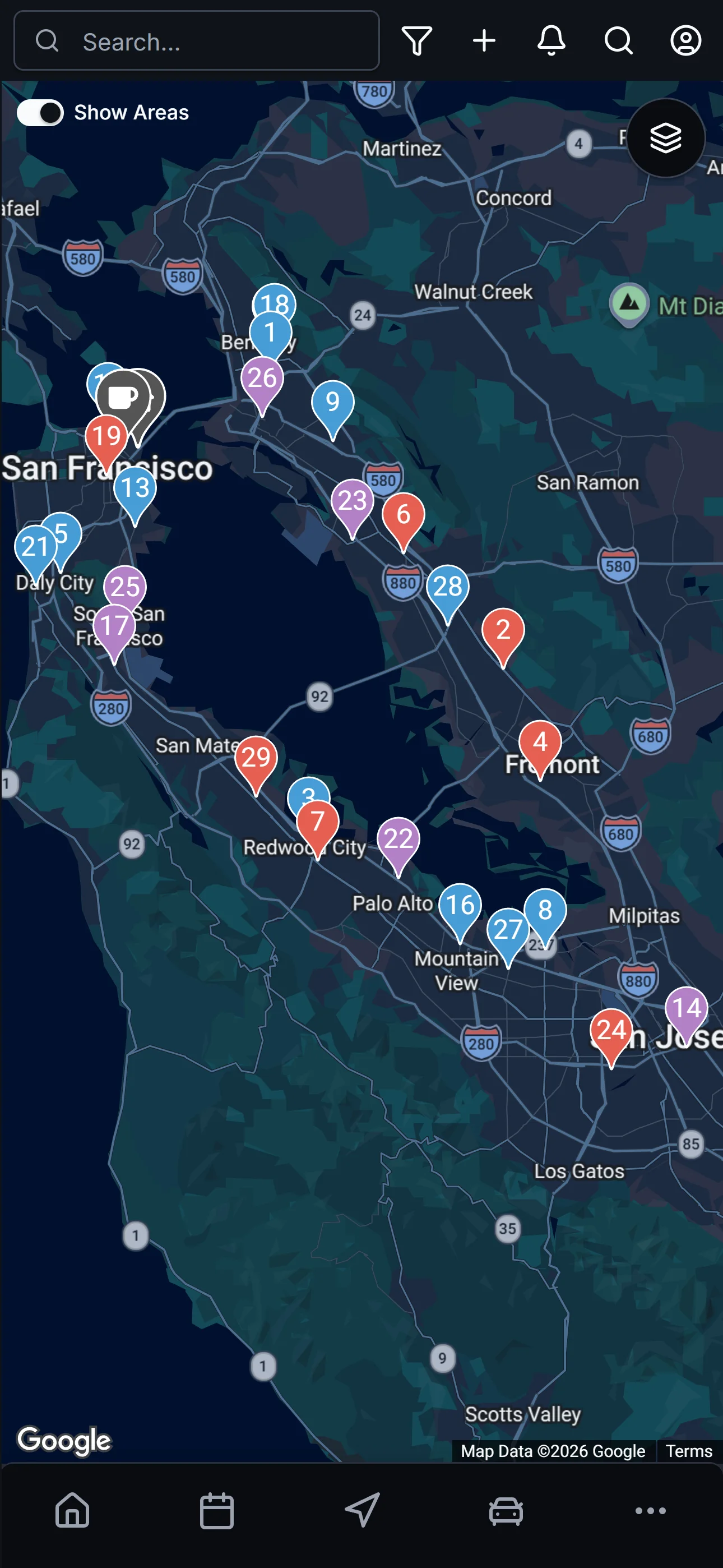 The same Map in dark mode: same patient pins on a teal-tinted dark map with Show Areas overlay enabled.